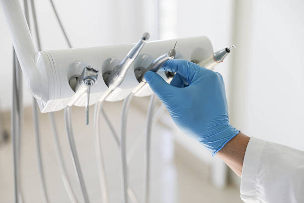 Professional Tooth Extraction technician working in Olivet, MI